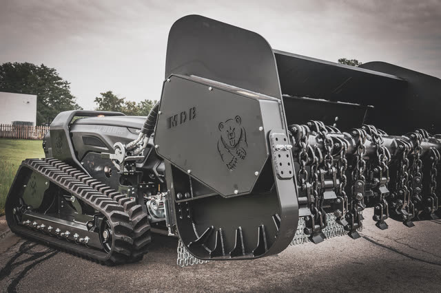 Close view of the chain flail drum.